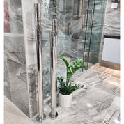 code-freestaing-heated-towel-rail-nz-chrome-in-tiled-bathroom-setting