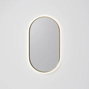 SOLACE LED MIRROR - OVAL 600MMX900MM BRUSHED BRASS FRAMED