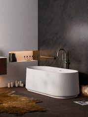 Modern bathroom with a white freestanding bathtub 